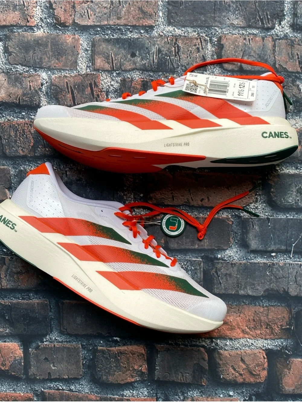 NEW Adidas EVO SL Miami Hurricanes Running Shoes Men's JQ2148 Size 11.5 (No Box)